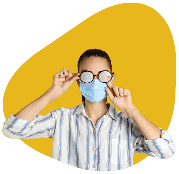 A woman wearing glasses with foggy lenses