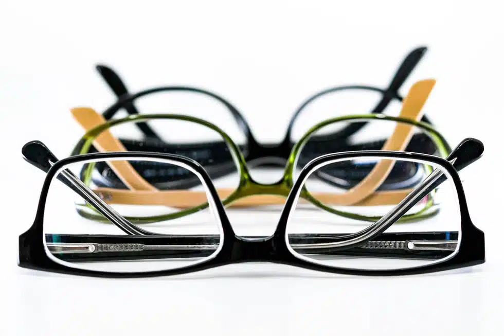 pairs of glasses after reglazing on a table