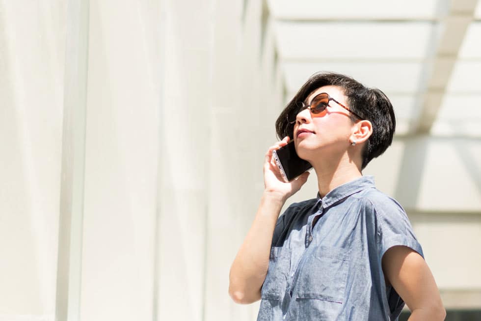 lady in photochromic lenses looking to the sky