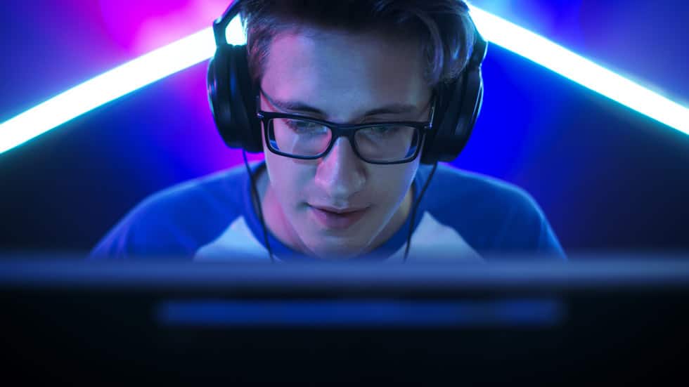 young man in gaming glasses