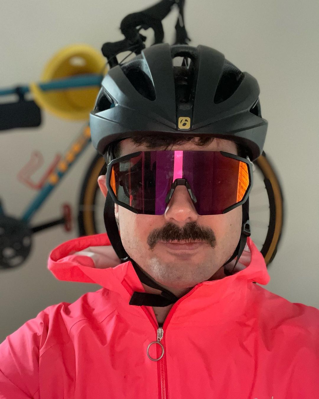 A cyclist wearing prescription cycling glasses