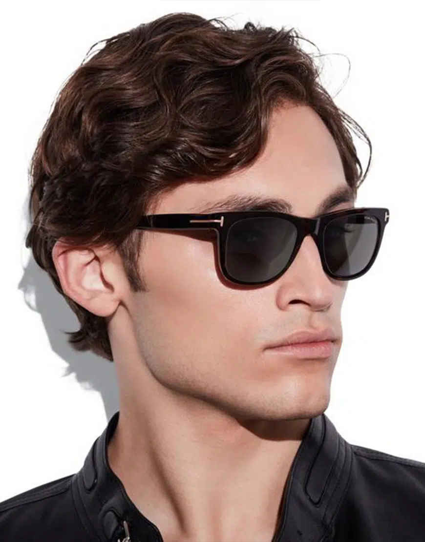 Man wearing Ray-Ban Aviators with dark lenses