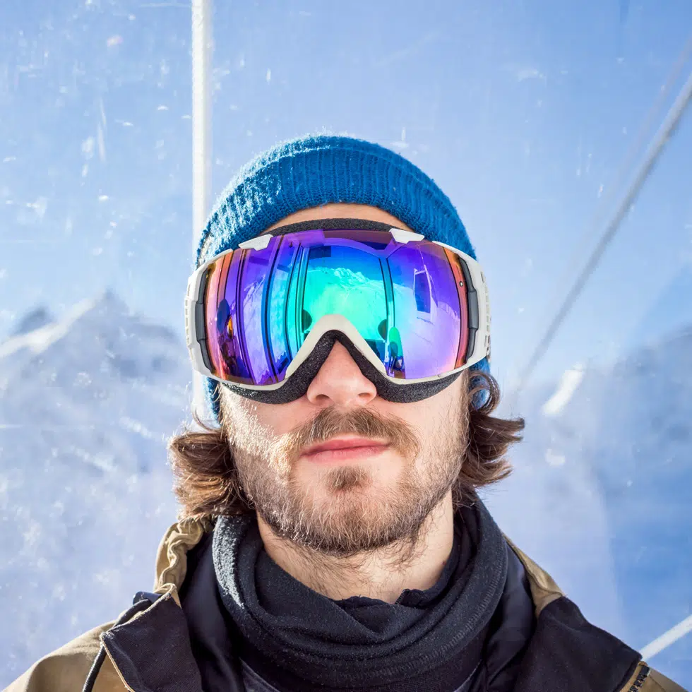 a man wearing a pair of prescription ski goggles
