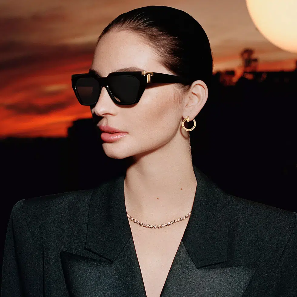 A woman wearing a pair of Tiffany&Co. sunglasses