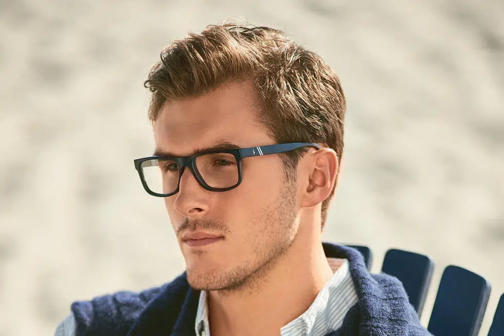 a person wearing glasses with Ralph Lauren replacement lenses