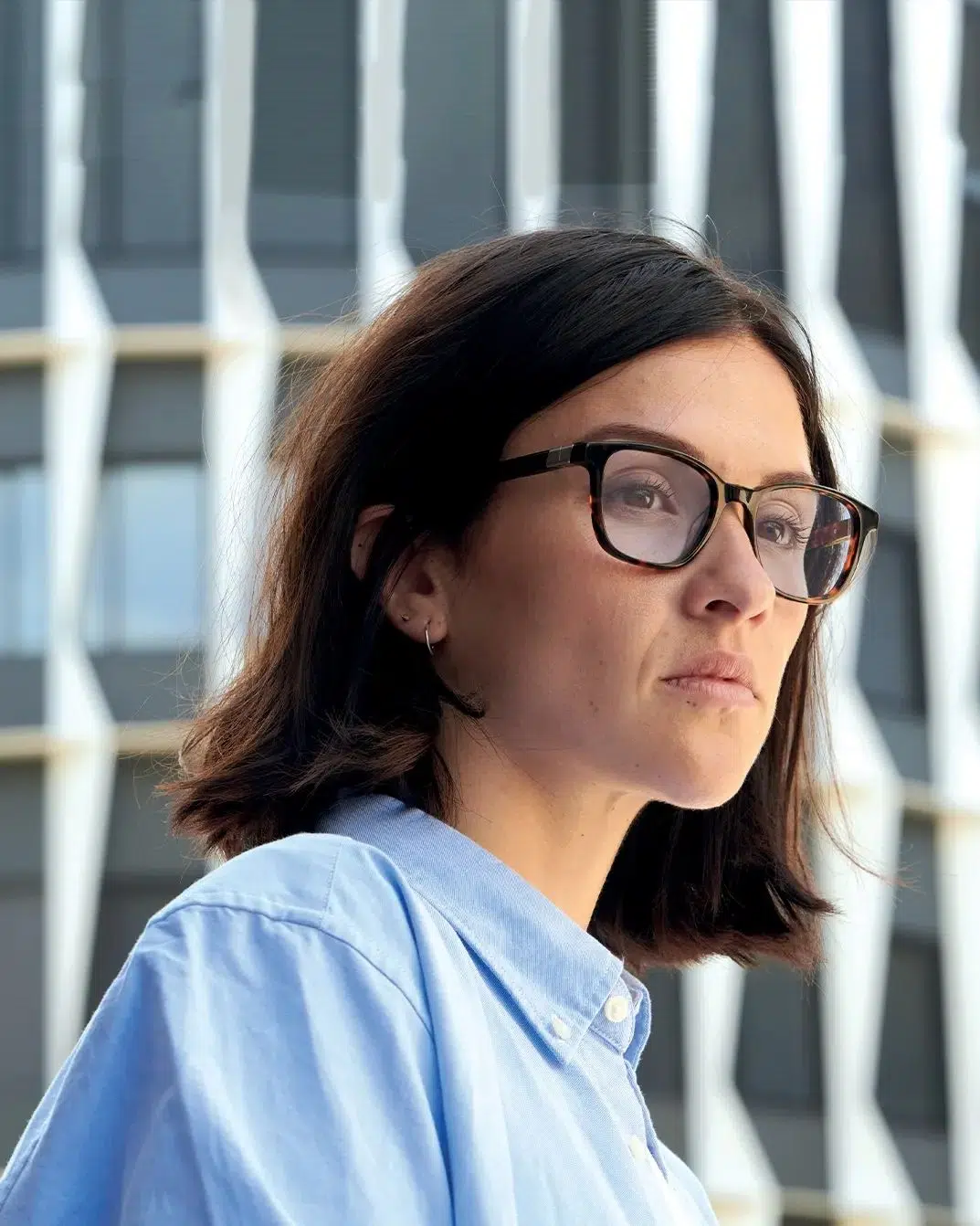 a person wearing glasses with Bollé replacement lenses