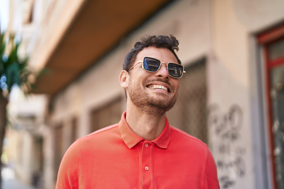 A man wearing a pair of Transitions® XTRActive® lenses