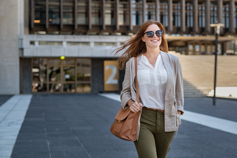 A woman wearing Transitions® Gen S lenses