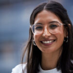 A woman wearing glasses with varifocal lenses