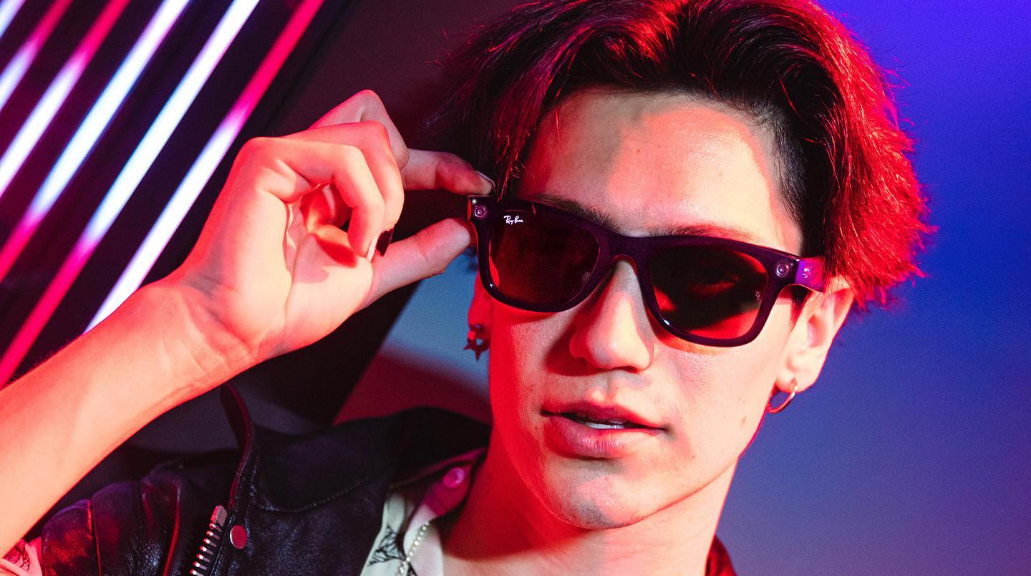 Man posing wearing Ray-Ban Meta glasses
