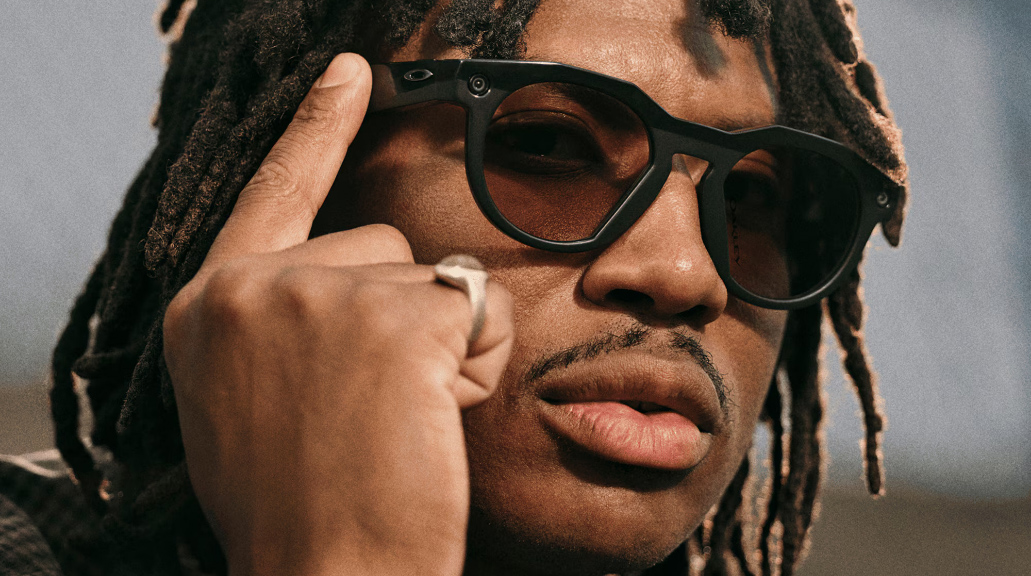 Man wearing Oakley Meta smart glasses