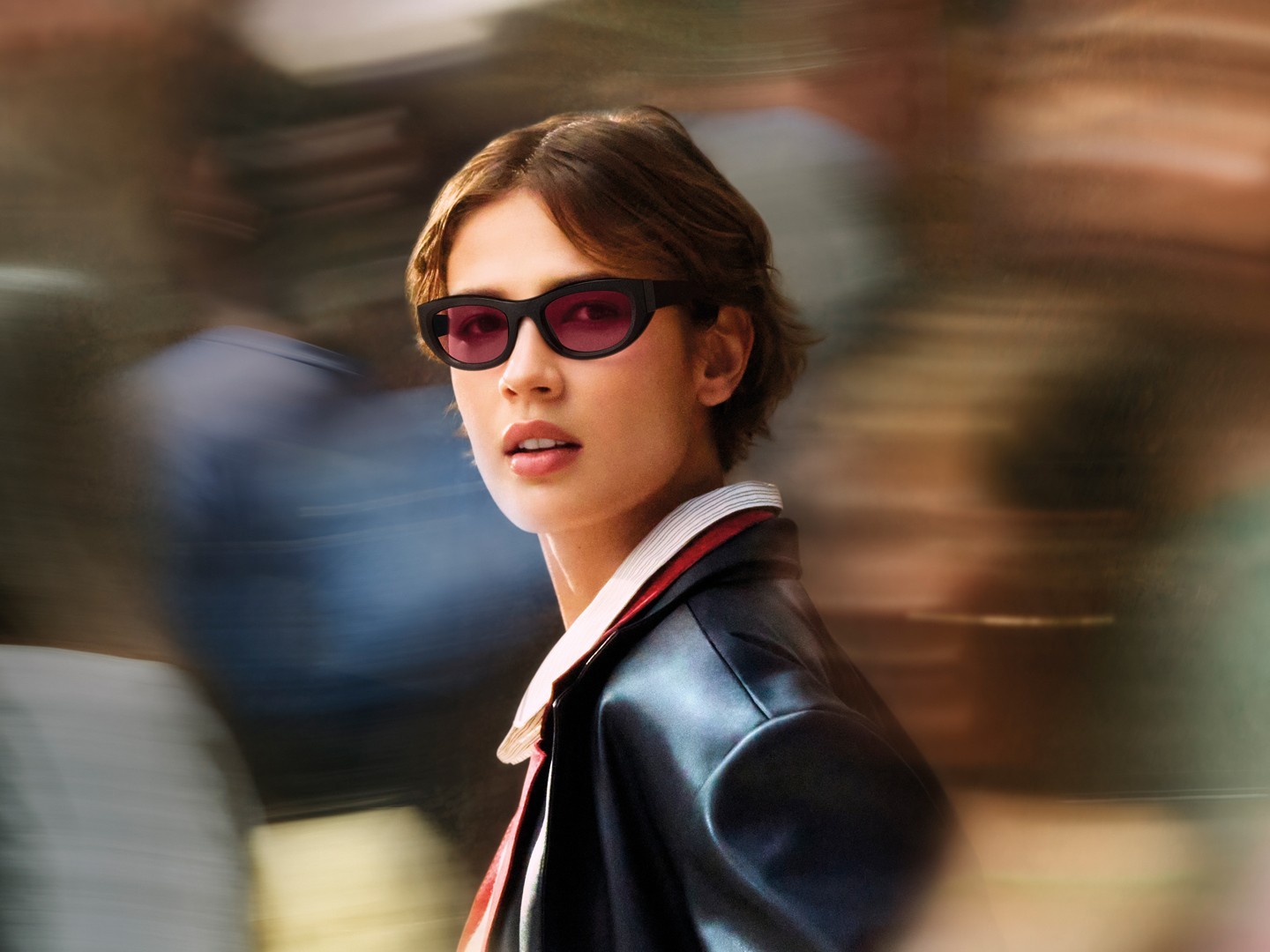 Transitions Lenses – Move Freely Woman wearing glasses with Transitions GEN S lenses