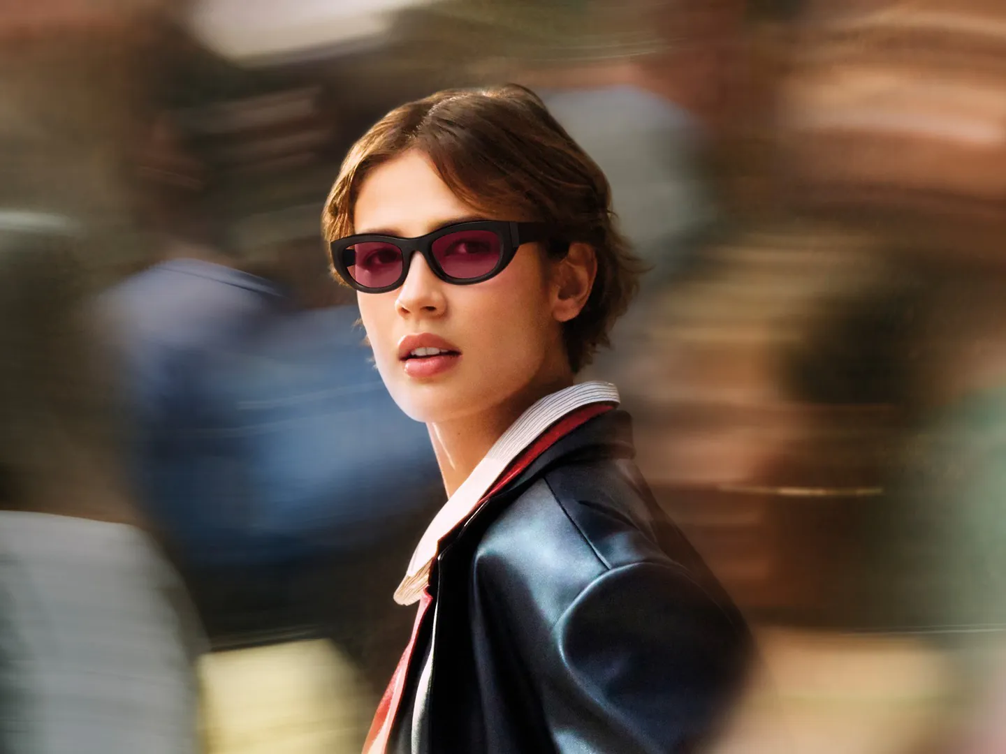 Transitions Lenses – Move Freely Woman wearing glasses with Transitions GEN S lenses